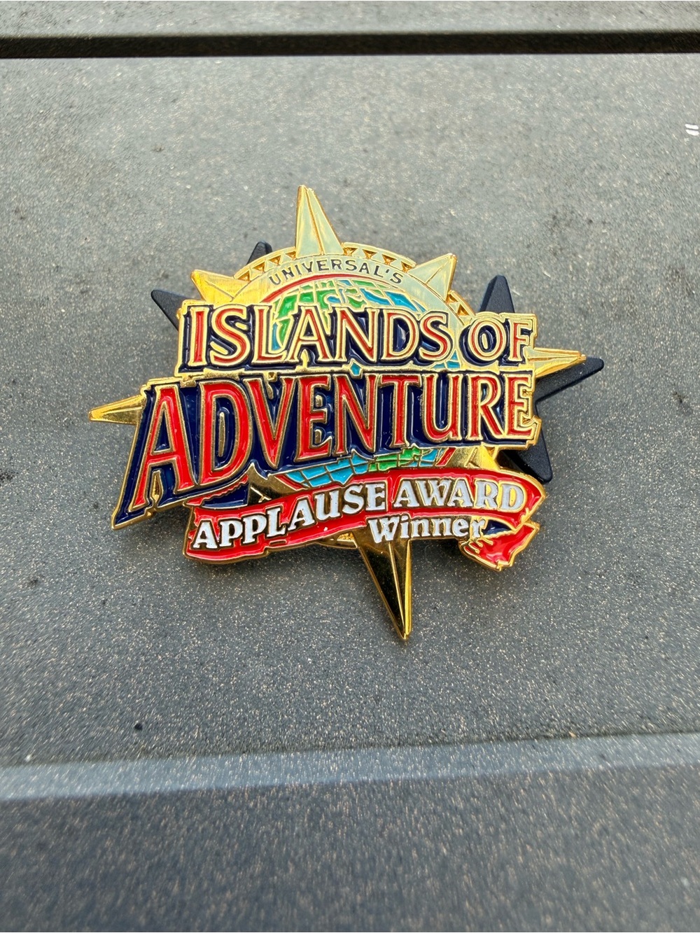 Universal's Islands of Adventure Enamel Pin - Red, Blue, Green, Gold